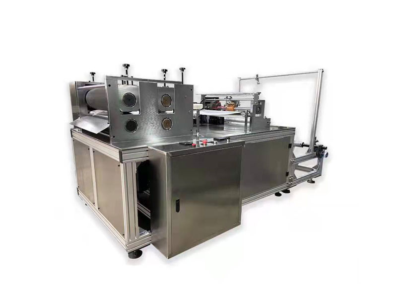 雨衣袖套片機(jī) 雨衣袖套片機(jī)